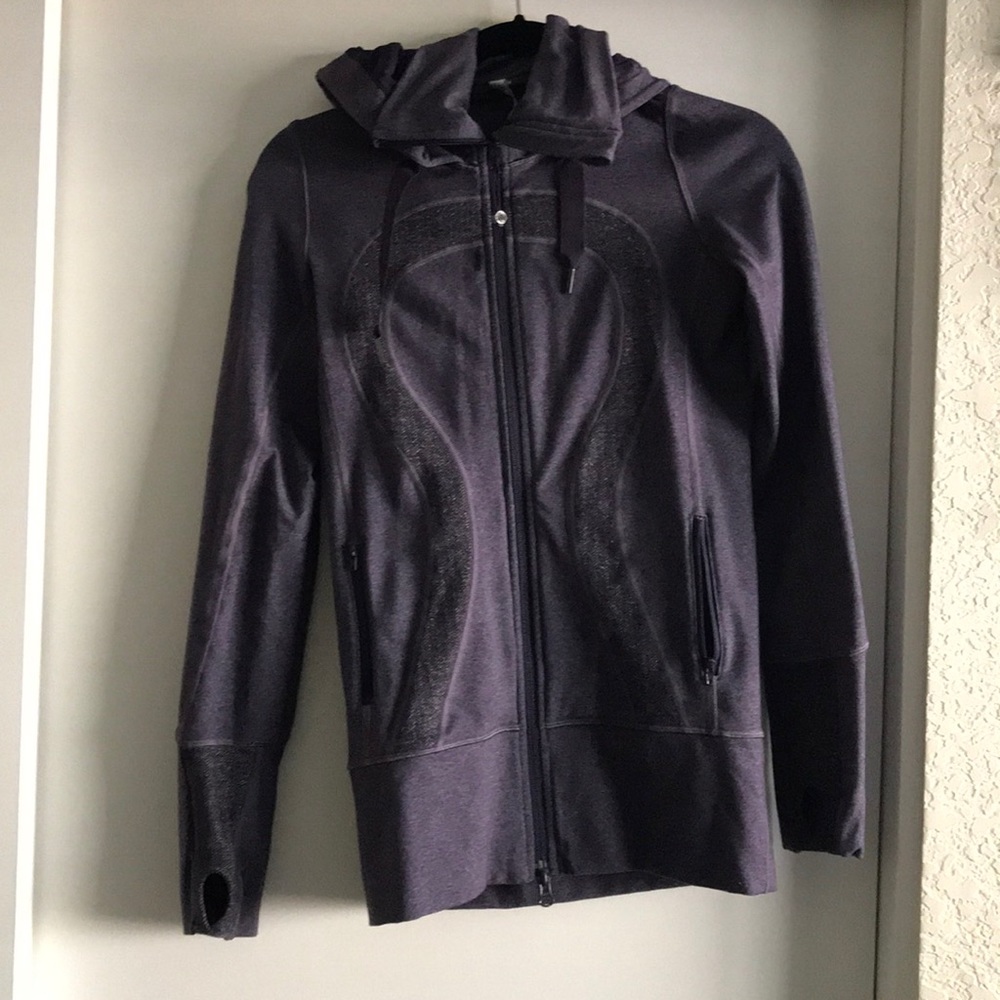 Purple lululemon hoodie.